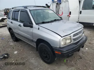 2002 Chevrolet Tracker z VIN 2CNBE13C926934704, wystawiony jako Copart lot #70717194 z przebiegiem 189 076 mil mil oraz Szkody całkowita. Historia ofert i sprzedaży dostępna na DreamBid. Obrazek 4.
