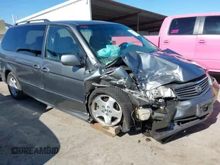 2001 Honda Odyssey EX z VIN 2HKRL18661H594904, wystawiony jako IAAI lot #42290273 z przebiegiem 212 774 mil mil oraz . Historia ofert i sprzedaży dostępna na DreamBid. Obrazek 1.