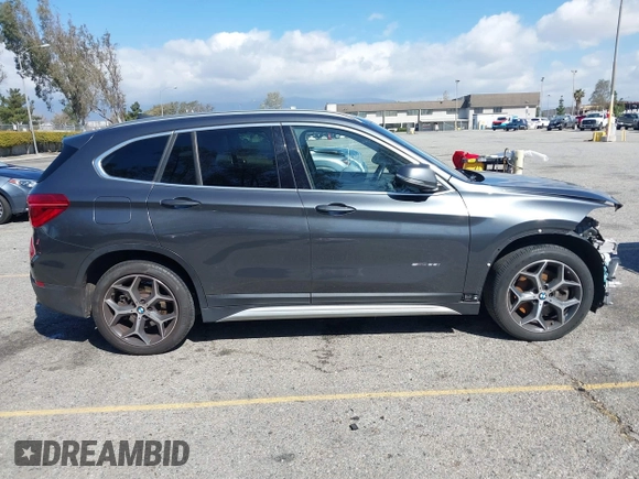 2018 BMW X1 sDrive28i with VIN WBXHU7C36J5L05628, listed as a IAAI auction lot 41708522 with 91,352 mi miles and . Bid and sale history available at DreamBid. Image 14.