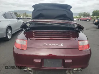 2006 Porsche 911 Carrera S z VIN WP0CB29956S769773, wystawiony jako Copart lot #54702225 z przebiegiem Nie podano mil oraz Szkoda całkowita • Salvage title. Historia ofert i sprzedaży dostępna na DreamBid. Obrazek 6.