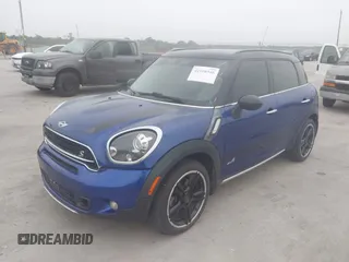 2015 MINI Cooper Countryman S with VIN WMWZC5C50FWP47426, listed as a IAAI auction lot 42108546 with 103,281 mi miles. Bid and sale history available at carsss.com. Image 2.