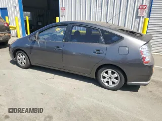 2007 Toyota Prius z VIN JTDKB20U373216659, wystawiony jako Copart lot #60930375 z przebiegiem 155 283 mil mil oraz Czysty tytuł • Clean title. Historia ofert i sprzedaży dostępna na DreamBid. Obrazek 2.