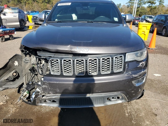 2017 Jeep Grand Cherokee Overland with VIN 1C4RJECGXHC696676, listed as a Copart auction lot 86885924 with 154,754 mi miles and Salvage Title. Bid and sale history available at carsss.com. Image 5.