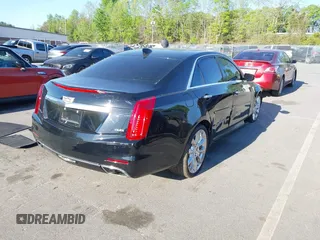 2015 Cadillac CTS Premium AWD with VIN 1G6AZ5S35F0129572, listed as a IAAI auction lot 42045670 with 62,758 mi miles and . Bid and sale history available at DreamBid. Image 4.