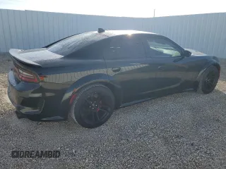 2021 Dodge Charger Scat Pack Widebody with VIN 2C3CDXGJ5MH637464, listed as a Copart auction lot 85671524 with 101,343 mi miles and Salvage Title. Bid and sale history available at carsss.com. Image 3.
