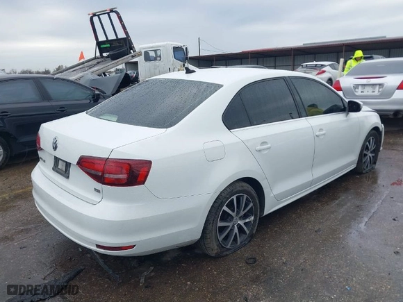2018 Volkswagen Jetta 1.4T SE with VIN 3VWDB7AJ1JM221517, listed as a IAAI auction lot 41329474 with 87,450 mi miles. Bid and sale history available at carsss.com. Image 4.