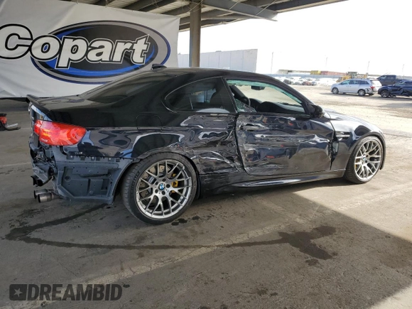 2012 BMW M3 with VIN WBSKG9C57CE798240, listed as a Copart auction lot 61774515 with 83,322 mi miles and Salvage title. Bid and sale history available at DreamBid. Image 3.