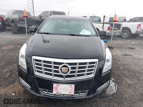 2015 Cadillac XTS Luxury with VIN 2G61M5S38F9138545, listed as a IAAI auction lot 41690696 with 136,460 mi miles and . Bid and sale history available at DreamBid. Image 12.