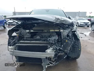 2017 Audi Q7 Premium Plus z VIN WA1LAAF77HD056813, wystawiony jako IAAI lot #42086340 z przebiegiem 83 774 mil mil oraz . Historia ofert i sprzedaży dostępna na DreamBid. Obrazek 13.