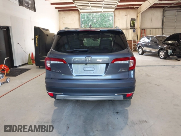2021 Honda Pilot Touring 8-Passenger with VIN 5FNYF6H95MB048527, listed as a IAAI auction lot 42542138 with 40,584 mi miles and . Bid and sale history available at DreamBid. Image 16.
