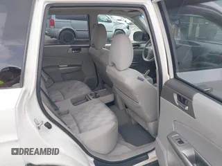 2010 Subaru Forester X Premium with VIN JF2SH6CC6AG726191, listed as a IAAI auction lot 42436604 with 153,758 mi miles and . Bid and sale history available at DreamBid. Image 8.