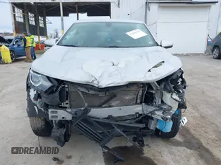 2018 Chevrolet Equinox LT z VIN 2GNAXSEV9J6212976, wystawiony jako IAAI lot #41643246 z przebiegiem 120 814 mil mil oraz . Historia ofert i sprzedaży dostępna na DreamBid. Obrazek 6.