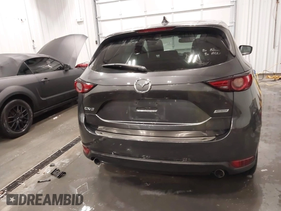 2017 Mazda CX-5 Grand Touring with VIN JM3KFADLXH0151593, listed as a IAAI auction lot 41823378 with 149,299 mi miles. Bid and sale history available at carsss.com. Image 16.