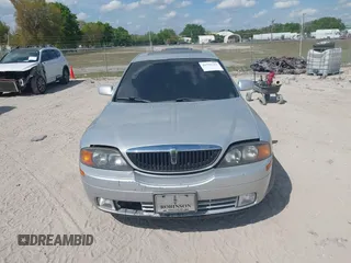 2000 Lincoln LS with VIN 1LNHM87A4YY886613, listed as a IAAI auction lot 41793515 with 144,061 mi miles. Bid and sale history available at carsss.com. Image 6.