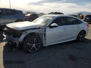 2023 Honda Civic Touring z VIN 2HGFE1F95PH314838, wystawiony jako Copart lot #52545085 z przebiegiem 29 863 mil mil oraz Szkoda całkowita • Salvage title. Historia ofert i sprzedaży dostępna na DreamBid. Obrazek 1.