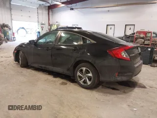 2019 Honda Civic Sedan LX with VIN 2HGFC2F69KH555697, listed as a IAAI auction lot 41664312 with 112,993 mi miles. Bid and sale history available at carsss.com. Image 3.