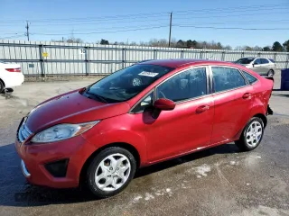 2011 Ford Fiesta SE with VIN 3FADP4BJ7BM161834, listed as a Copart auction lot 48598205 with 95,259 mi miles and Salvage Title. Bid and sale history available at carsss.com. Image 1.
