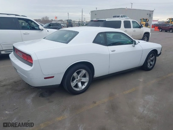 2014 Dodge Challenger SXT with VIN 2C3CDYAG8EH126884, listed as a IAAI auction lot 41423275 with 334,497 mi miles. Bid and sale history available at carsss.com. Image 4.
