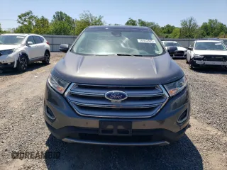 2015 Ford Edge Titanium z VIN 2FMPK4K8XFBB98334, wystawiony jako Copart lot #56953495 z przebiegiem 110 129 mil mil oraz Szkody całkowita. Historia ofert i sprzedaży dostępna na DreamBid. Obrazek 5.