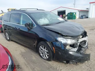 2020 Chrysler Voyager LXI with VIN 2C4RC1DG2LR262141, listed as a IAAI auction lot 41711714 with NaN miles. Bid and sale history available at carsss.com. Image 1.