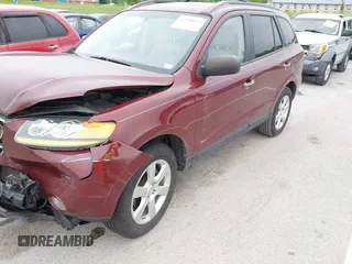 2009 Hyundai Santa Fe SE z VIN 5NMSH13E39H313491, wystawiony jako IAAI lot #42340674 z przebiegiem 149 024 mil mil oraz . Historia ofert i sprzedaży dostępna na DreamBid. Obrazek 12.
