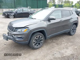 2020 Jeep Compass Trailhawk with VIN 3C4NJDDB3LT200268, listed as a IAAI auction lot 42250192 with 73,804 mi miles and . Bid and sale history available at DreamBid. Image 17.