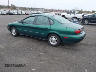1999 Ford Taurus z VIN 1FAFP52S9XG309250, wystawiony jako IAAI lot #41797222 z przebiegiem 102 676 mil mil oraz . Historia ofert i sprzedaży dostępna na DreamBid. Obrazek 4.