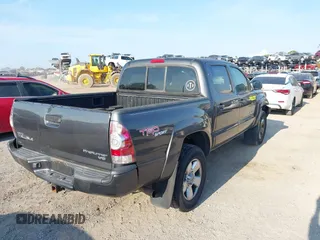 2011 Toyota Tacoma PreRunner with VIN 3TMJU4GN6BM117602, listed as a IAAI auction lot 41483053 with 209,591 mi miles and . Bid and sale history available at DreamBid. Image 4.