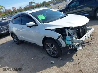 2021 Honda HR-V EX-L with VIN 3CZRU5H73MM724496, listed as a IAAI auction lot 41458426 with 71,506 mi miles. Bid and sale history available at carsss.com. Image 1.