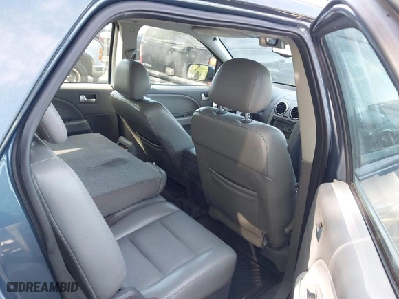 2005 Ford Freestyle SEL with VIN 1FMDK02105GA06621, listed as a IAAI auction lot 42008979 with 230,861 mi miles. Bid and sale history available at carsss.com. Image 7.