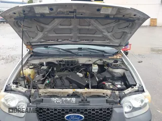 2005 Ford Escape XLT with VIN 1FMCU93115KC10947, listed as a IAAI auction lot 42215066 with 128,475 mi miles and . Bid and sale history available at DreamBid. Image 10.