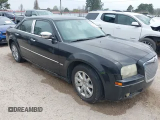 2010 Chrysler 300 Touring with VIN 2C3CA5CV0AH329717, listed as a IAAI auction lot 41785694 with 257,072 mi miles. Bid and sale history available at carsss.com. Image 1.