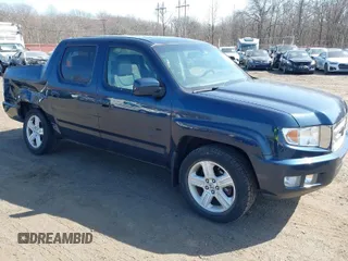 2011 Honda Ridgeline RTL with VIN 5FPYK1F51BB011686, listed as a IAAI auction lot 41790303 with 110,648 mi miles. Bid and sale history available at carsss.com. Image 1.