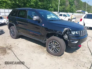 2017 Jeep Grand Cherokee Trailhawk with VIN 1C4RJFLG4HC940652, listed as a IAAI auction lot 42135489 with 102,593 mi miles and . Bid and sale history available at DreamBid. Image 1.