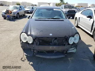 2003 Mercedes-Benz CLK-Class 5.0L with VIN WDBTJ75J43F018571, listed as a Copart auction lot 72736304 with 125,780 mi miles and Salvage Title. Bid and sale history available at carsss.com. Image 5.