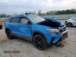 2022 Volkswagen Taos SE z VIN 3VVLX7B27NM062985, wystawiony jako Copart lot #51644395 z przebiegiem 41 883 mil mil oraz Szkody całkowita. Historia ofert i sprzedaży dostępna na DreamBid. Obrazek 11.