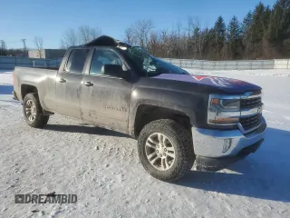 2016 Chevrolet Silverado 1500 LT with VIN 1GCVKREC2GZ267704, listed as a Copart auction lot 42228345 with 94,945 mi miles and Salvage Title. Bid and sale history available at DreamBid. Image 4.
