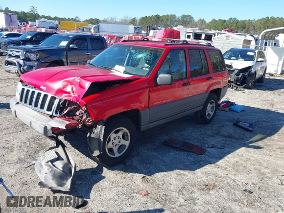 1996 Jeep Grand Cherokee Laredo with VIN 1J4EX58S8TC122302, listed as a IAAI auction lot 41218573 with 195,392 mi miles. Bid and sale history available at carsss.com. Image 17.