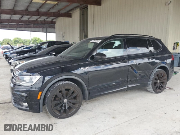 2021 Volkswagen Tiguan SE with VIN 3VV3B7AX4MM095257, listed as a Copart auction lot 60690015 with 61,782 mi miles and Salvage title. Bid and sale history available at DreamBid. Image 1.