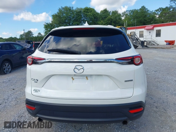 2022 Mazda CX-9 Touring z VIN JM3TCBCY7N0600787, wystawiony jako IAAI lot #42240512 z przebiegiem 27 927 mil mil oraz . Historia ofert i sprzedaży dostępna na DreamBid. Obrazek 16.