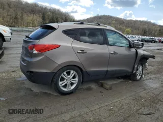 2011 Hyundai Tucson Limited with VIN KM8JUCAC2BU200517, listed as a Copart auction lot 53252005 with 158,502 mi miles and Salvage Title. Bid and sale history available at DreamBid. Image 3.