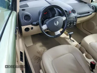 2009 Volkswagen Beetle S с VIN 3VWRF31Y19M402077, выставлен на аукционе Copart как лот 50770415 с пробегом 59 674 миль миль и Списание • Salvage title. История ставок и продаж доступна на DreamBid. Изображение 8.