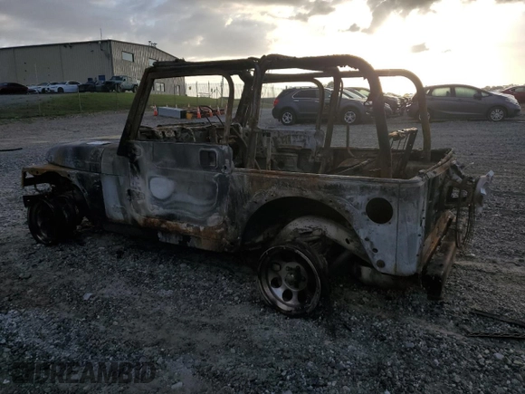 2004 Jeep Wrangler Rubicon with VIN 1J4FA69S54P710341, listed as a Copart auction lot 51749175 with Not provided miles and Non repairable. Bid and sale history available at DreamBid. Image 2.