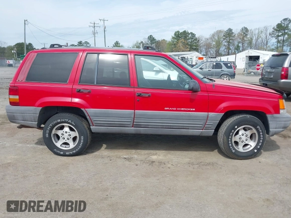 1996 Jeep Grand Cherokee Laredo with VIN 1J4FX58S4TC346218, listed as a IAAI auction lot 41943268 with 138,431 mi miles and . Bid and sale history available at DreamBid. Image 13.