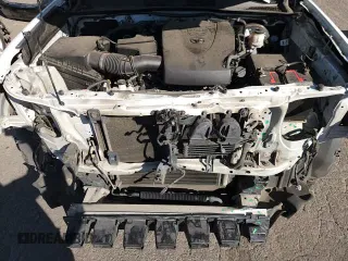 2019 Toyota Tacoma SR5 z VIN 5TFSZ5AN0KX187059, wystawiony jako Copart lot #81185185 z przebiegiem 121 776 mil mil oraz Szkoda całkowita • Salvage title. Historia ofert i sprzedaży dostępna na DreamBid. Obrazek 14.