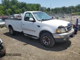 2000 Ford F-150 XL с VIN 1FTPF18L2YNA18807, выставлен на аукционе Copart как лот 62648305 с пробегом Не указан миль и Списание • Salvage title. История ставок и продаж доступна на DreamBid. Изображение 4.