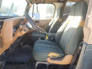 1995 Jeep Wrangler Sahara with VIN 1J4FY49S4SP268925, listed as a Copart auction lot 76695774 with 158,363 mi miles and Clean Title. Bid and sale history available at carsss.com. Image 7.