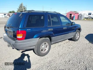 2001 Jeep Grand Cherokee Laredo with VIN 1J4GW48N31C727194, listed as a IAAI auction lot 42703915 with 176,896 mi miles and . Bid and sale history available at DreamBid. Image 4.
