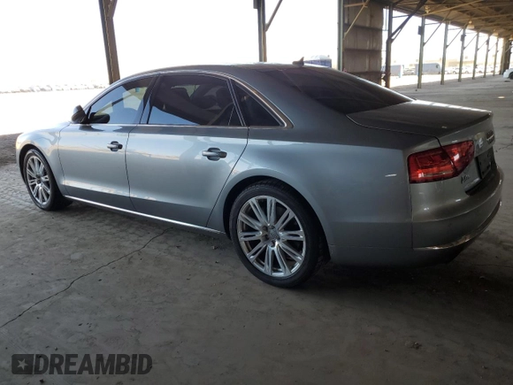 2012 Audi A8 with VIN WAURVAFD0CN028037, listed as a Copart auction lot 61004815 with 97,424 mi miles and Salvage title. Bid and sale history available at DreamBid. Image 2.