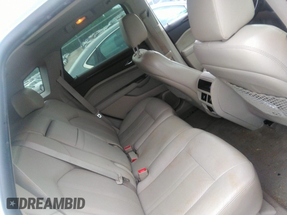 2012 Cadillac SRX Performance Collection z VIN 3GYFNBE32CS653172, wystawiony jako IAAI lot #42287435 z przebiegiem 161 065 mil mil oraz . Historia ofert i sprzedaży dostępna na DreamBid. Obrazek 8.